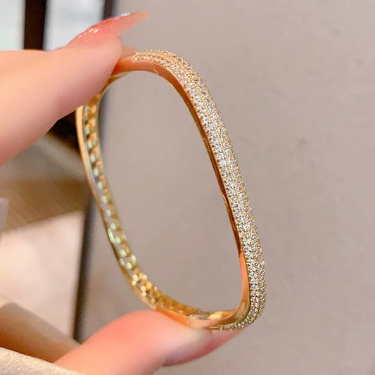 Elegant Rectangular Bangle with Sparkling Stone Accents JLTB0855