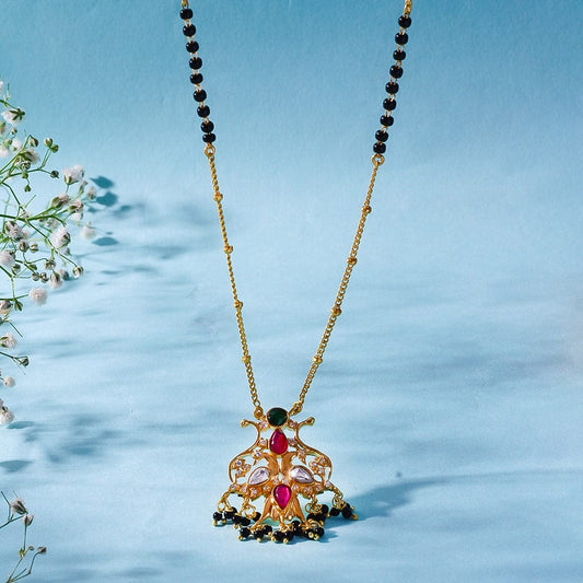 Statement silver necklace with traditional detailing, styled with matching earrings for a festive look