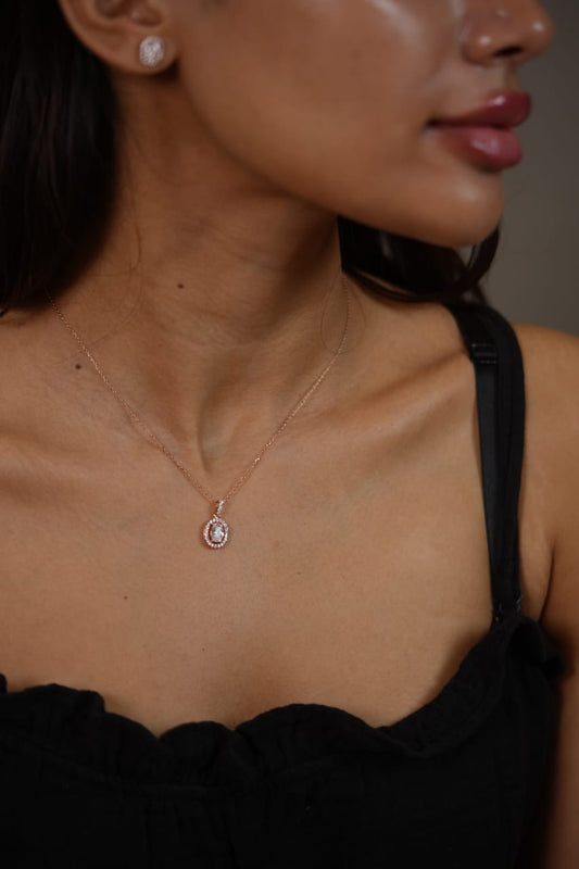 Oval 1 carat halo Solitaire Pendant Set with Solitaires