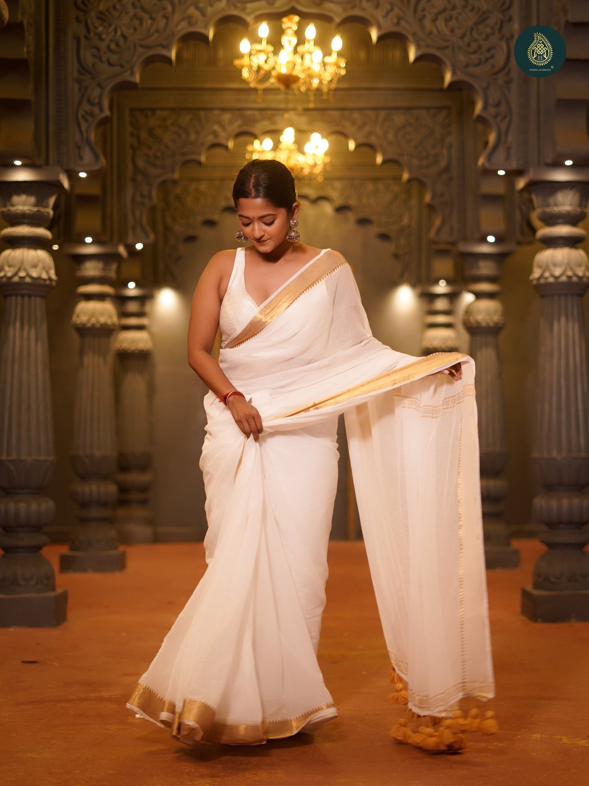 Coco White Thiruvonam Mul Cotton Solid Saree