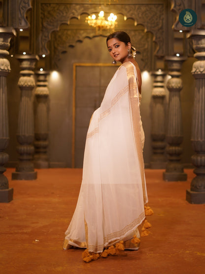 Coco White Thiruvonam Mul Cotton Solid Saree