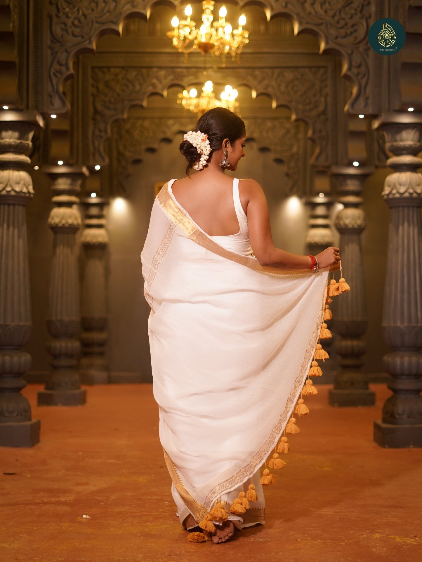 Coco White Thiruvonam Mul Cotton Solid Saree