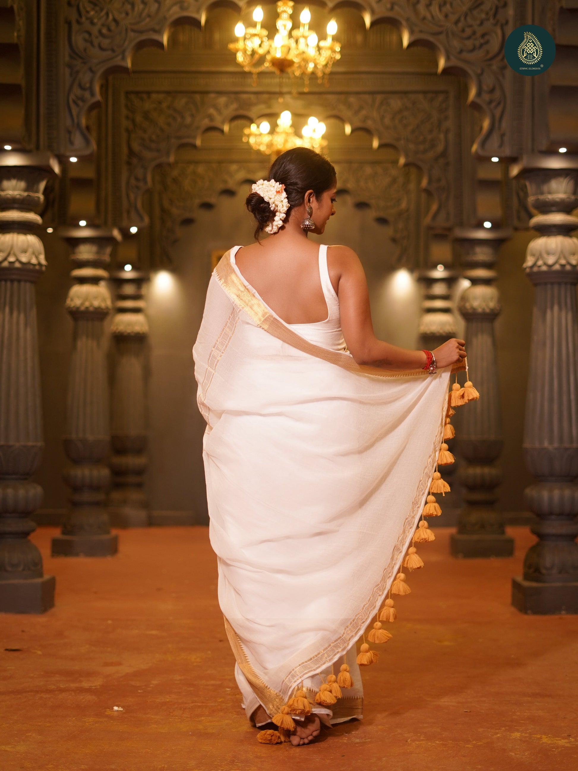 Coco White Thiruvonam Mul Cotton Solid Saree
