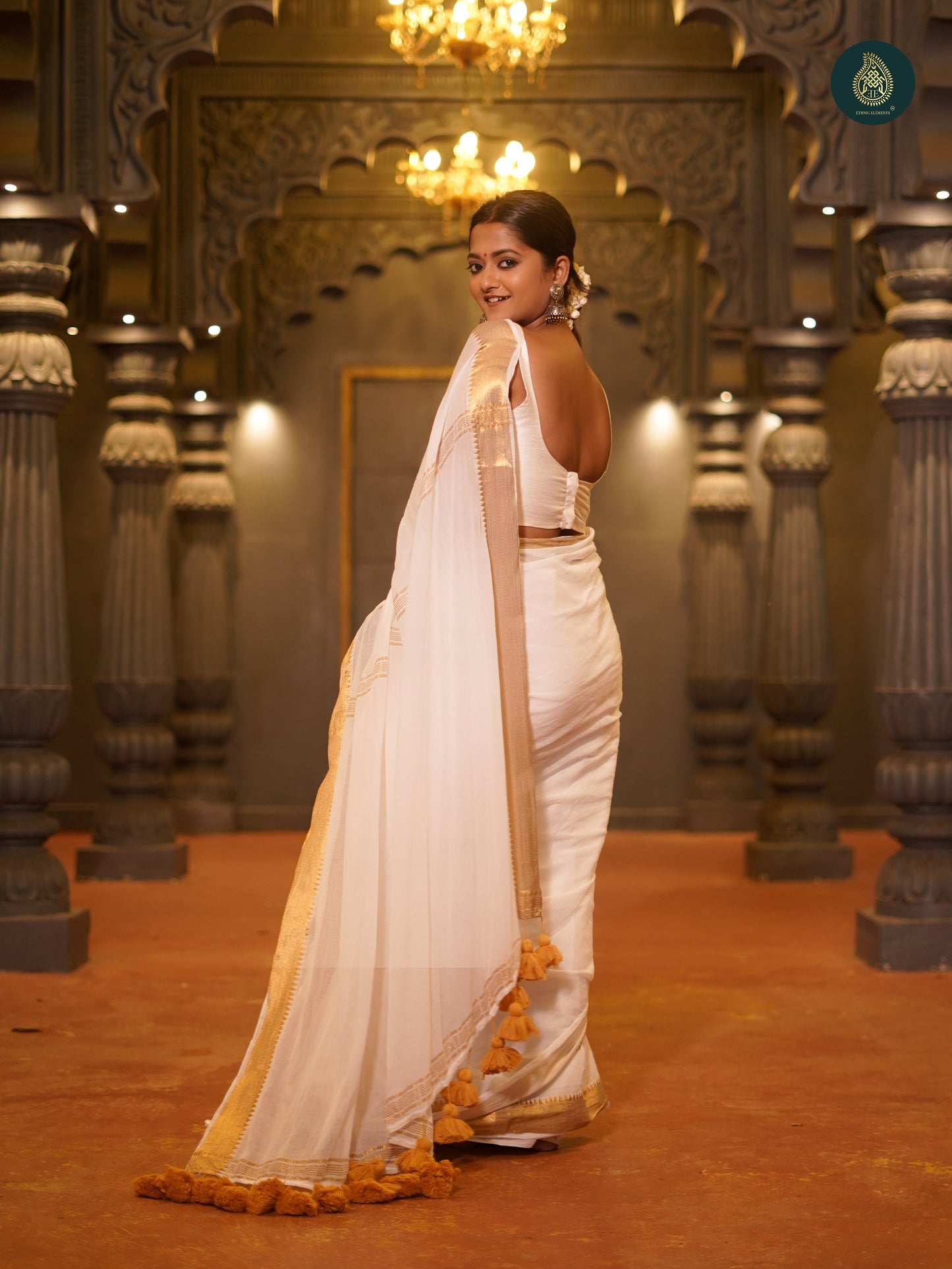 Coco White Thiruvonam Mul Cotton Solid Saree
