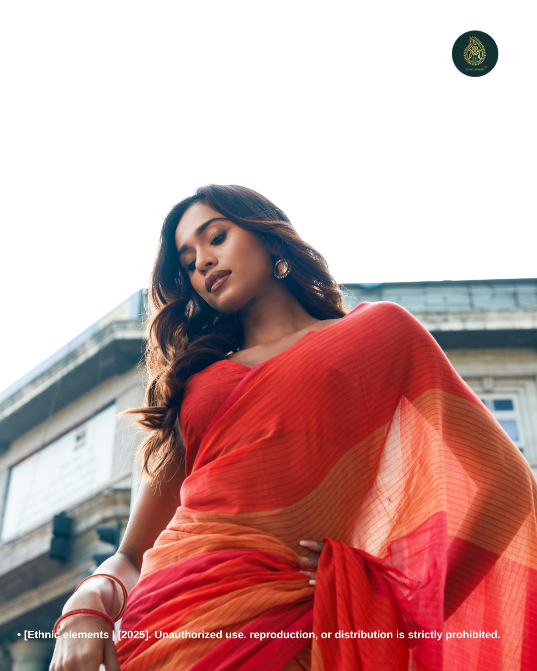 Sunset Glow Handwoven Mul Cotton Saree With Playful Checks & Tassels