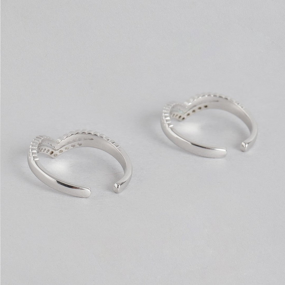 Two V-shaped open 925 Sterling Silver toe rings for women studded with CZ stones – Zavya