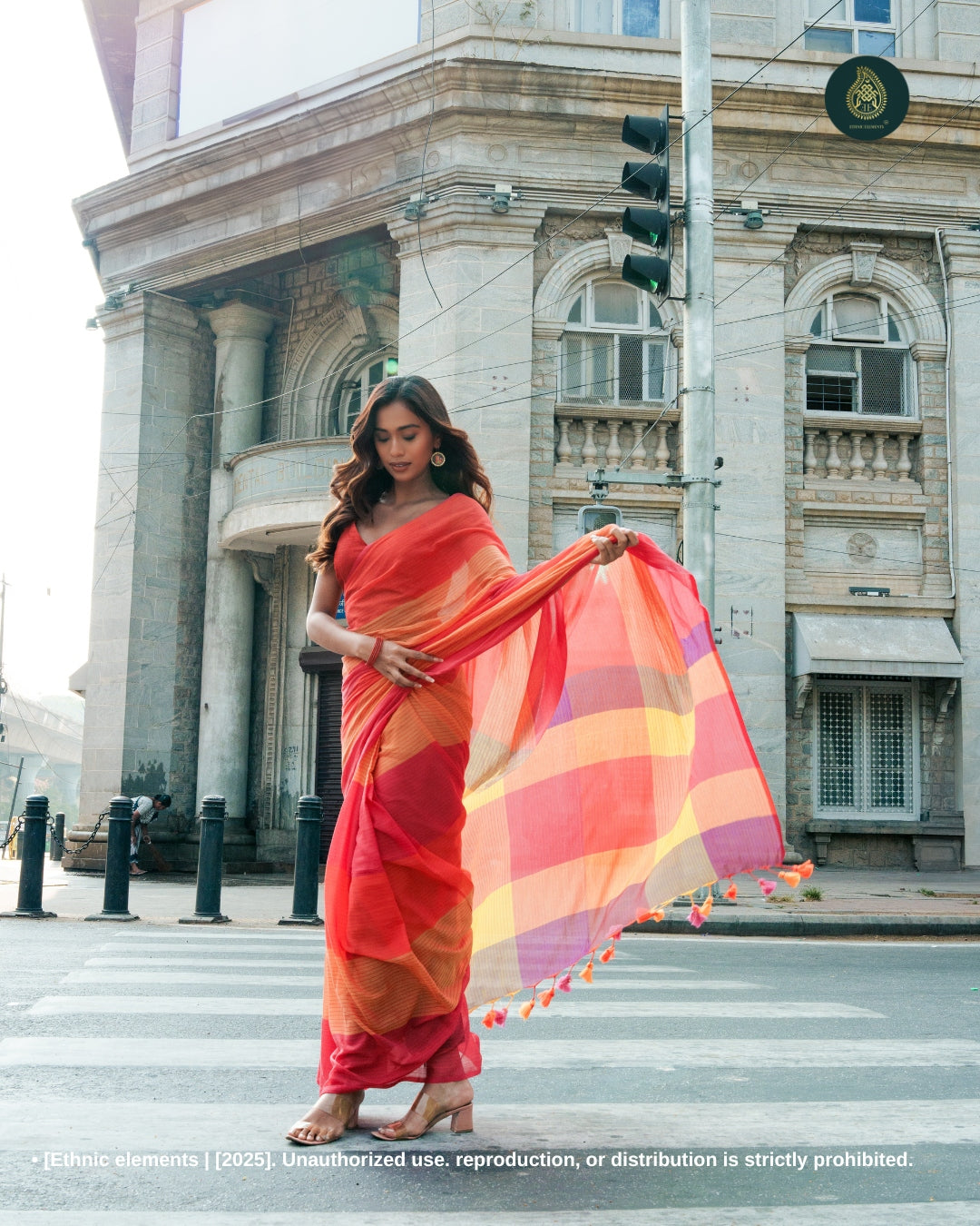 Sunset Glow Handwoven Mul Cotton Saree With Playful Checks & Tassels