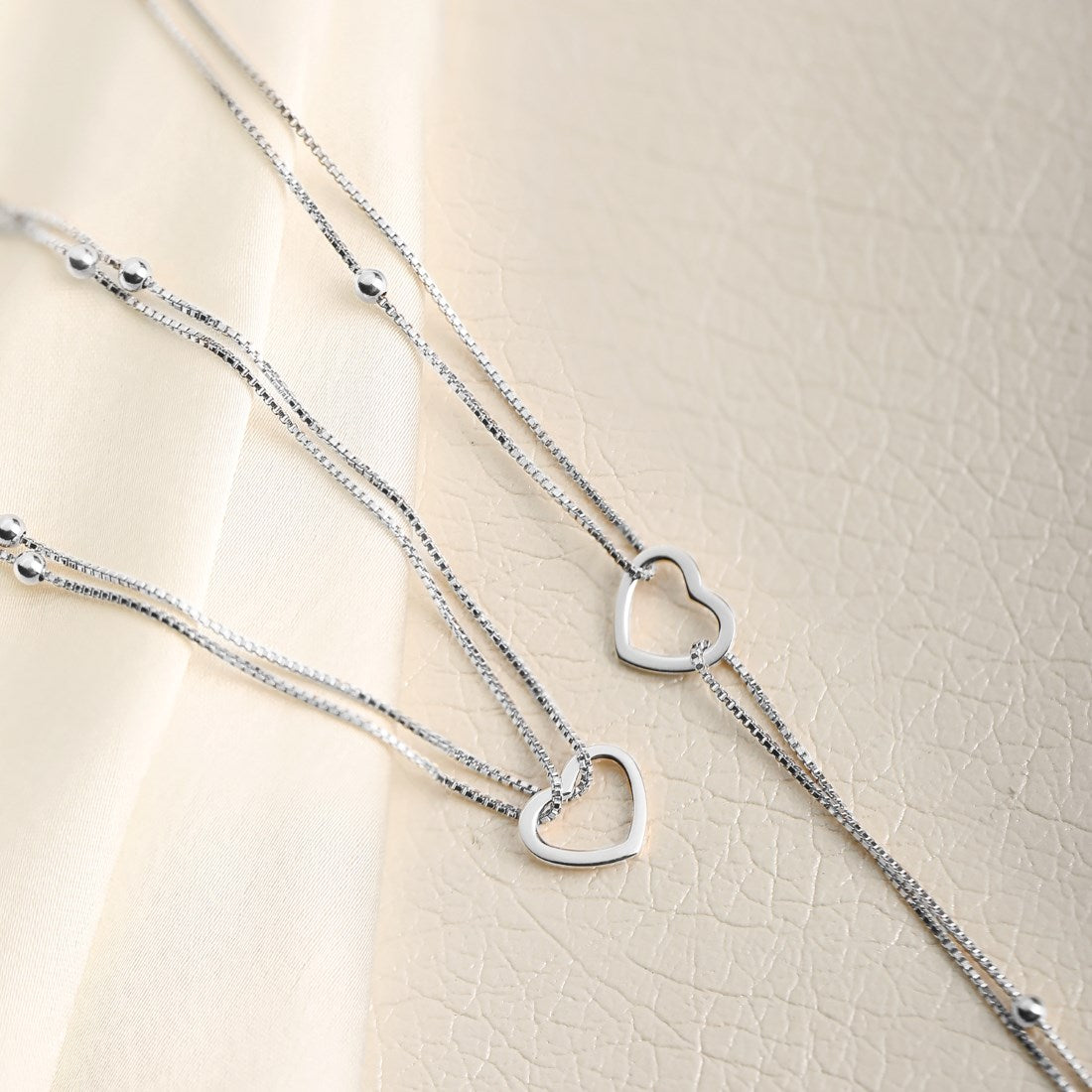 Women's layered 925 Sterling Silver anklet with delicate beaded chains and open heart charms – Zavya