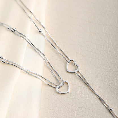 Women's layered 925 Sterling Silver anklet with delicate beaded chains and open heart charms – Zavya
