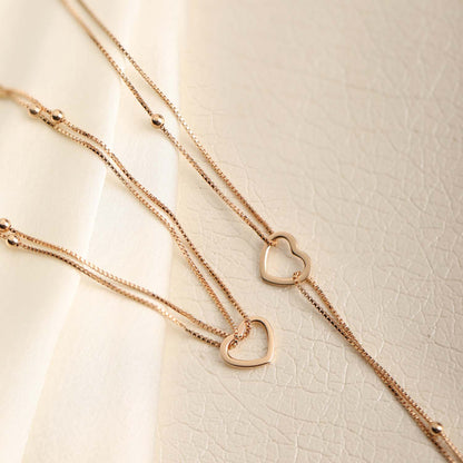 Dainty 925 Sterling Silver anklets. Women's jewellery with layered chains, open heart charms and beads. – Zavya
