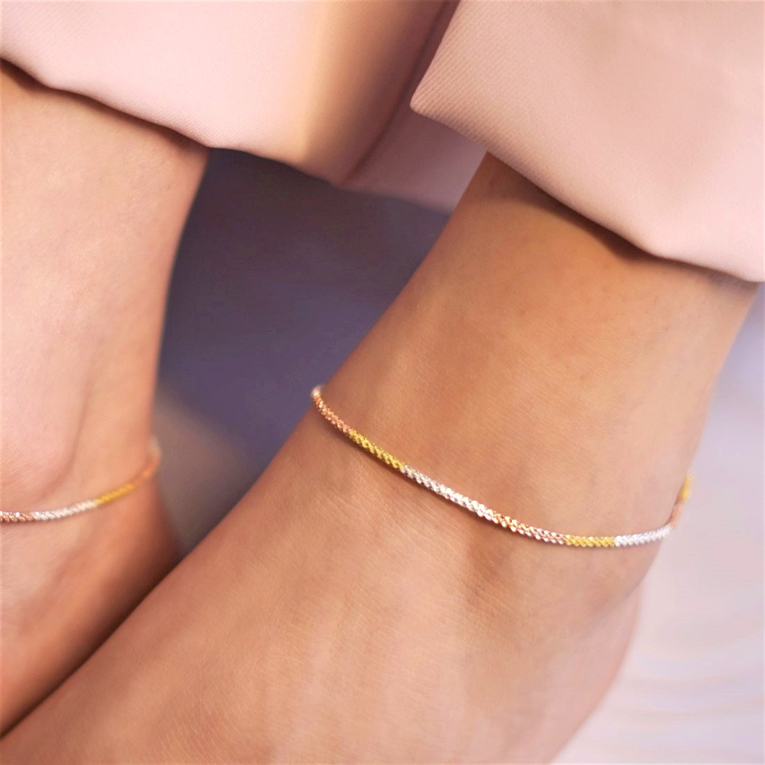 Woman wearing a triple tone weave 925 Sterling Silver anklet. Elegant silver jewellery for women – Zavya