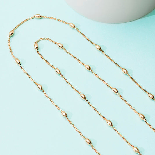 Rose gold beaded 925 Sterling Silver anklet chain for women. Fine jewellery on a blue background. – Zavya
