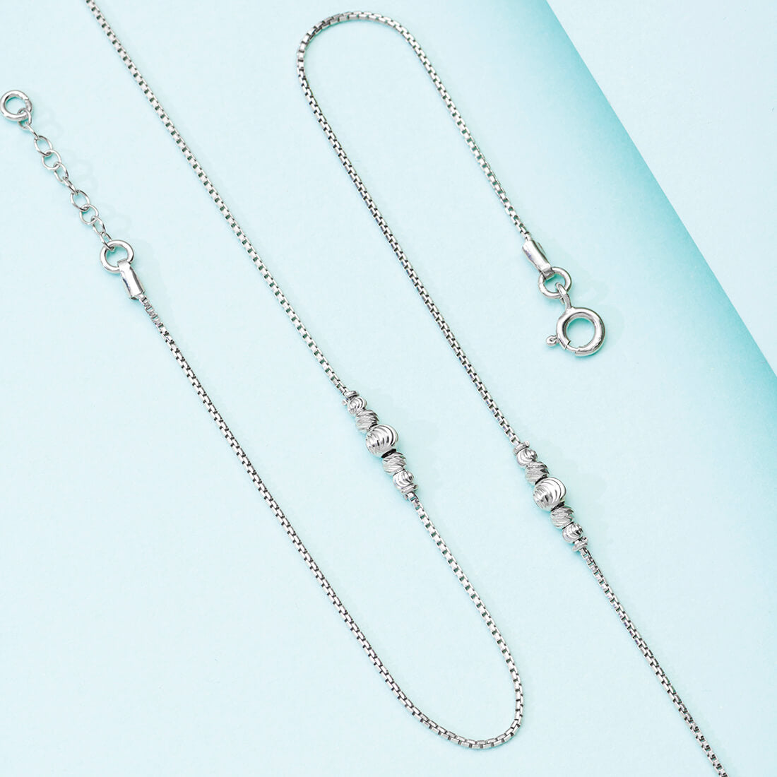 Women's 925 Sterling Silver anklet. Silver jewellery chain featuring bold textured beads and clasp – Zavya