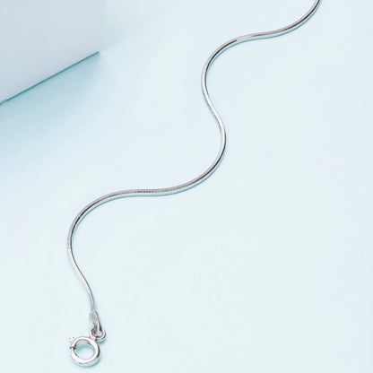925 Sterling Silver snake chain anklet for women featuring a smooth wavy design and spring ring clasp. – Zavya