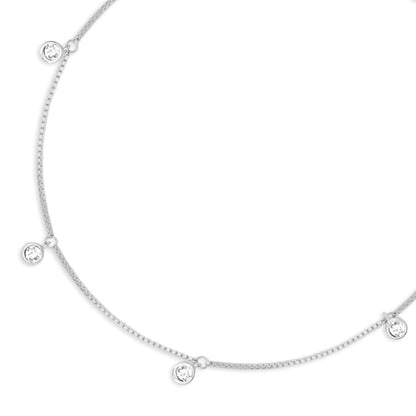 925 Sterling Silver anklet for women featuring a fine chain with dangling round CZ stones. – Zavya