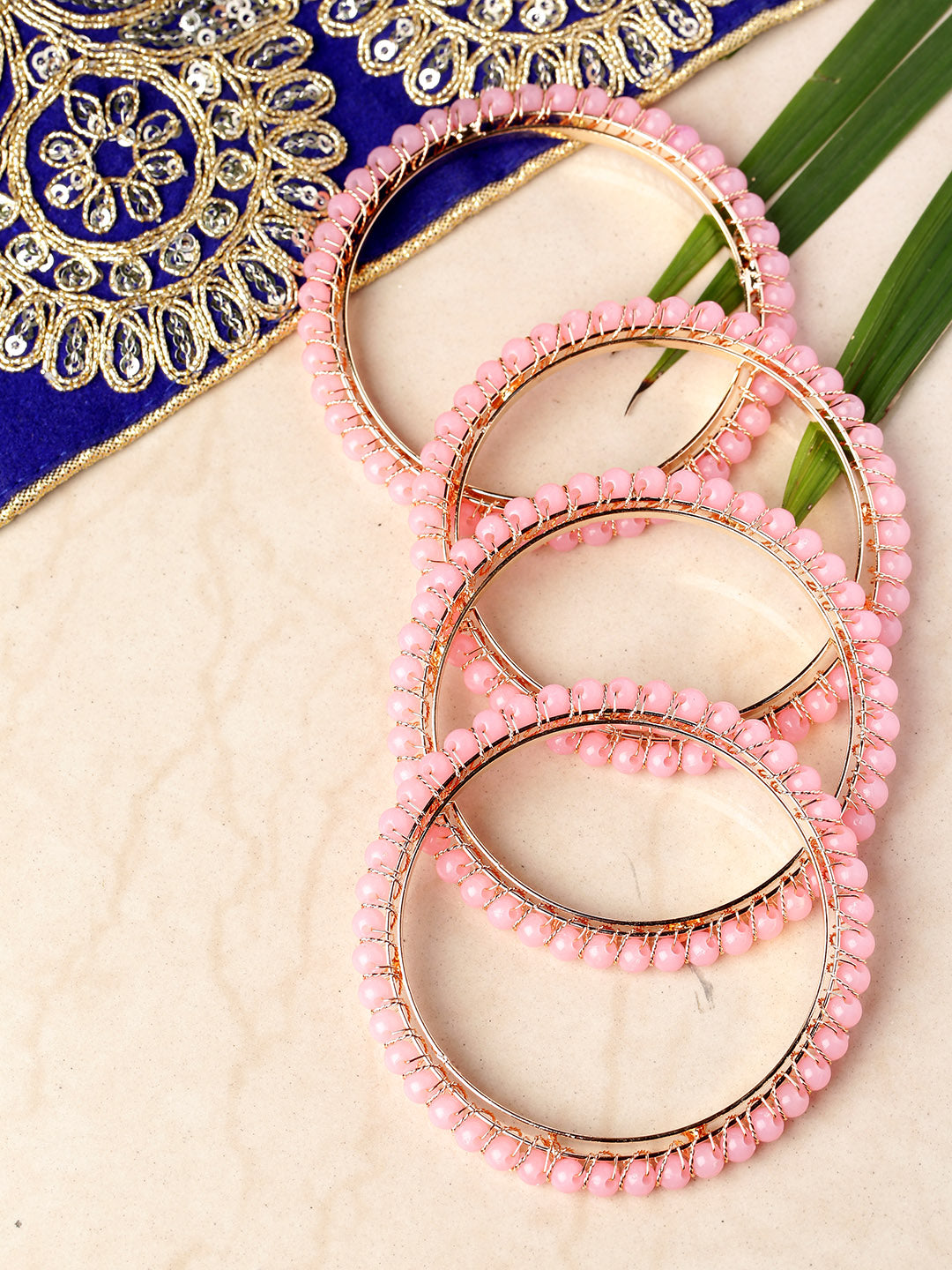 Set Of 4 Gold-Plated Pink Beaded Bangles