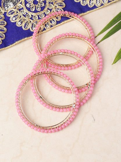 Set Of 4 Gold-Plated Pink Beaded Bangles