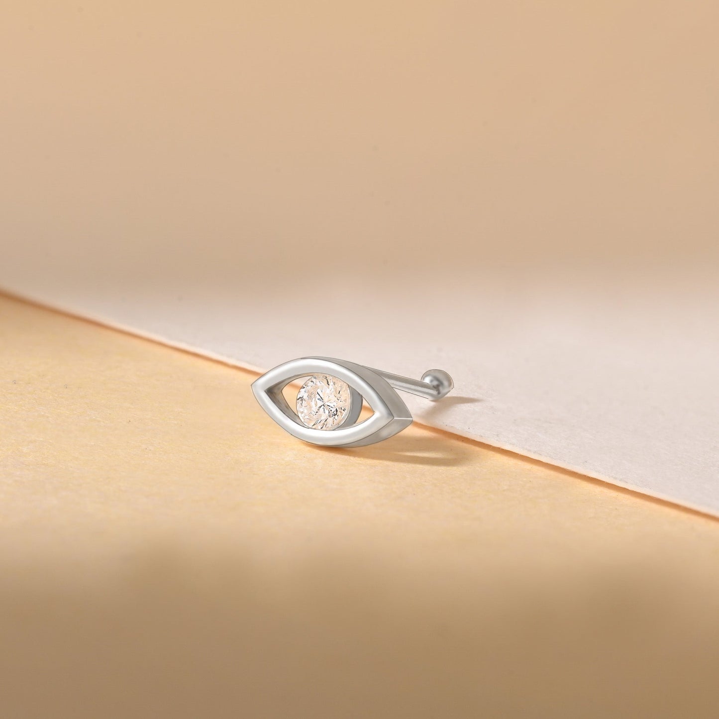 Gleaming Eye Nose Pin