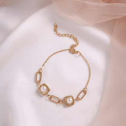 Bewitched Golden Pearl Linked Bracelet