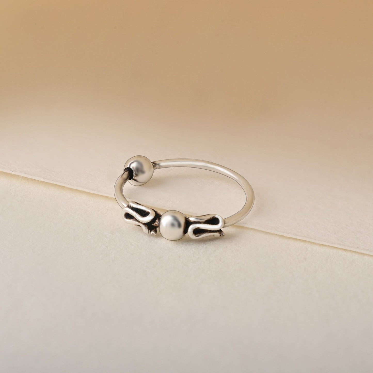 Oxidised motif Nose Ring