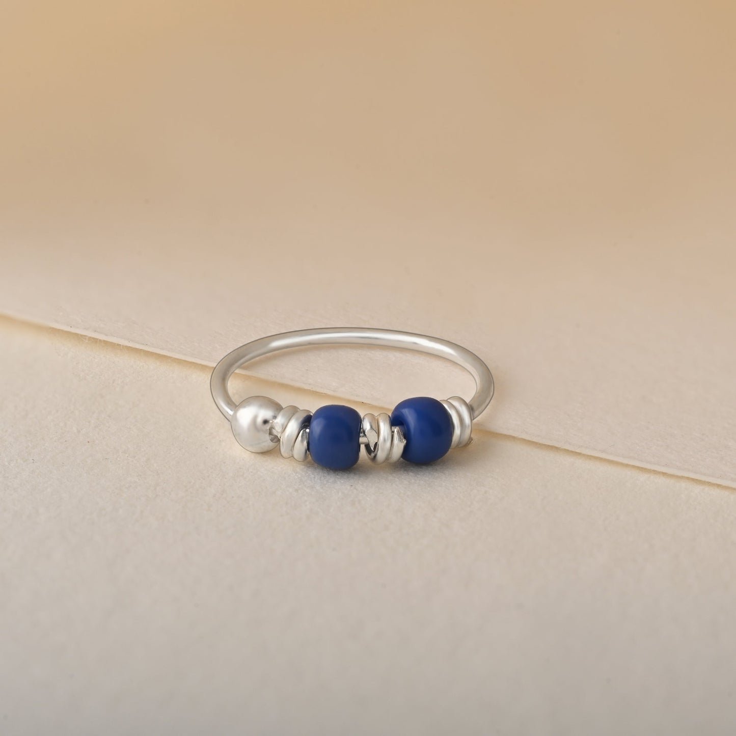 Small Blue Bead Nose Ring