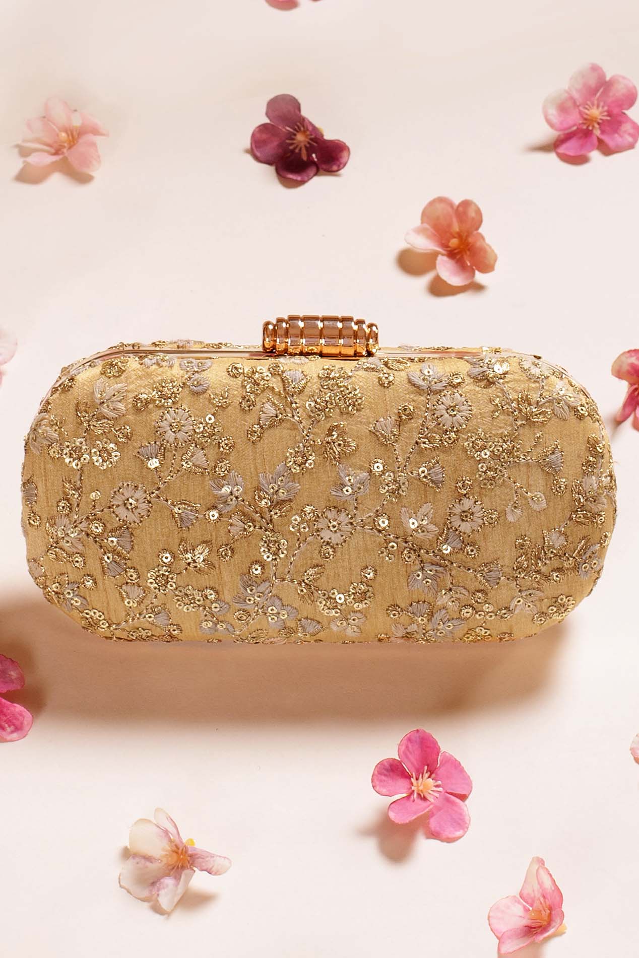 AMYRA - Elan gold capsule clutch