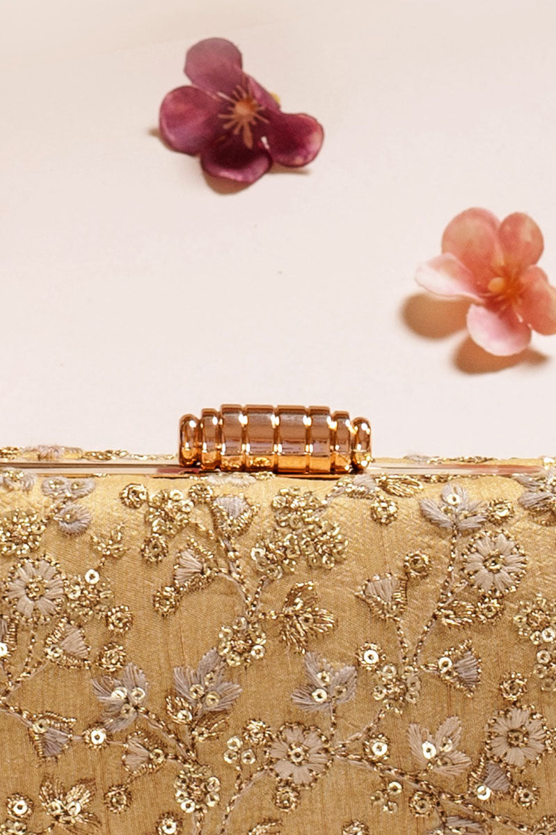 AMYRA - Elan gold capsule clutch