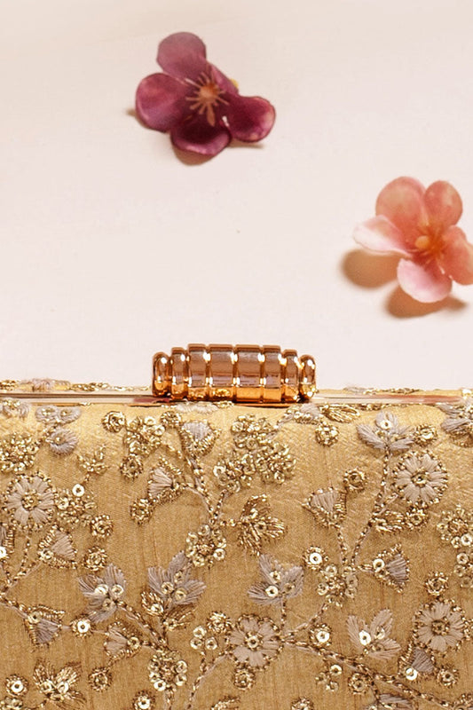 AMYRA - Elan gold capsule clutch