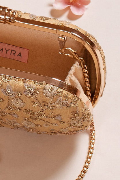 AMYRA - Elan gold capsule clutch
