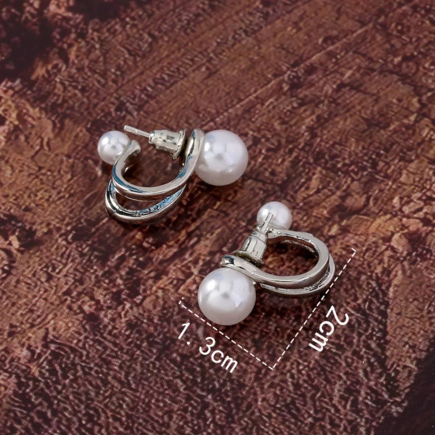 White pearl twisted Pin Earrings JLT13640
