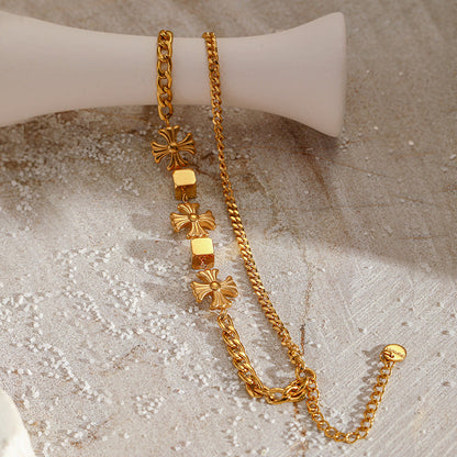 Elegant Multi-Layer Gold Chain Bracelet with floral and Cube Accents JLTB0686