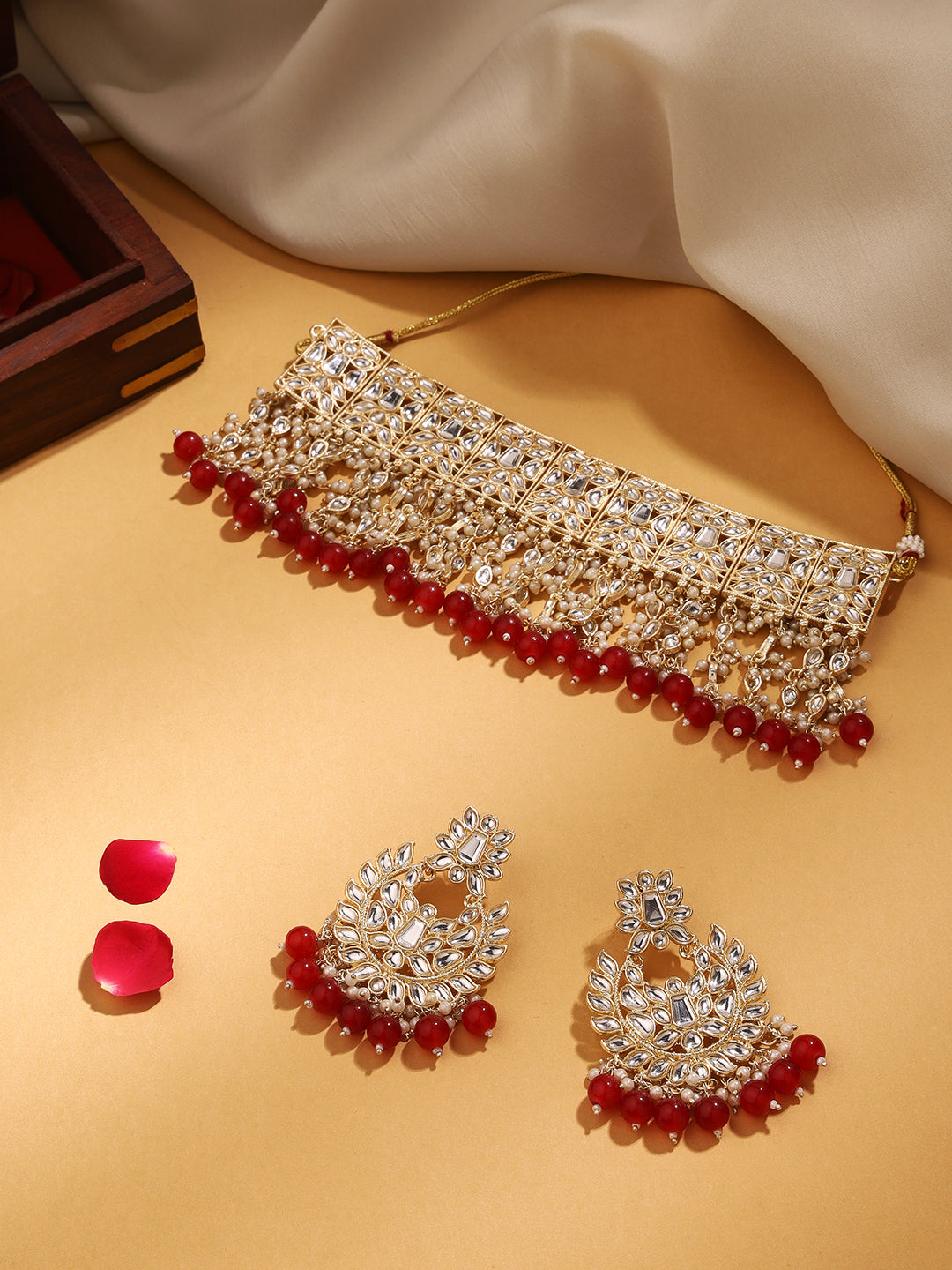 Priyaasi Ethereal Choker Set Adorned with Kundan and Rubies, Paired with Chandbali Beauty