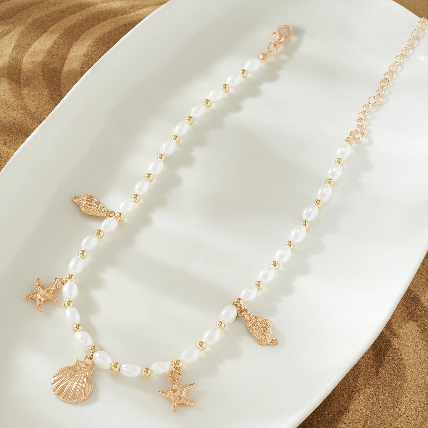 Florine Gold Seashells Necklace