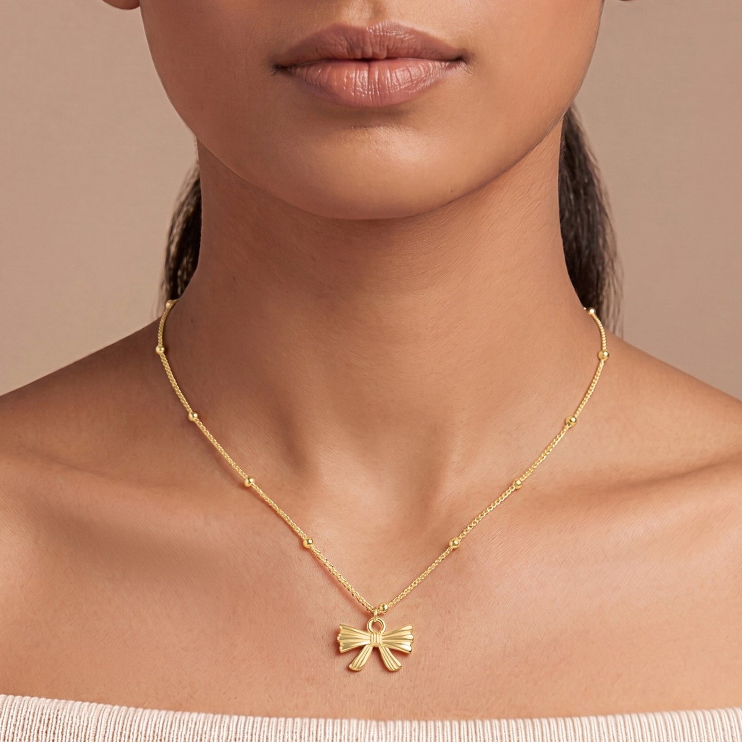 Cici Bow-Styled Gold Love Necklace