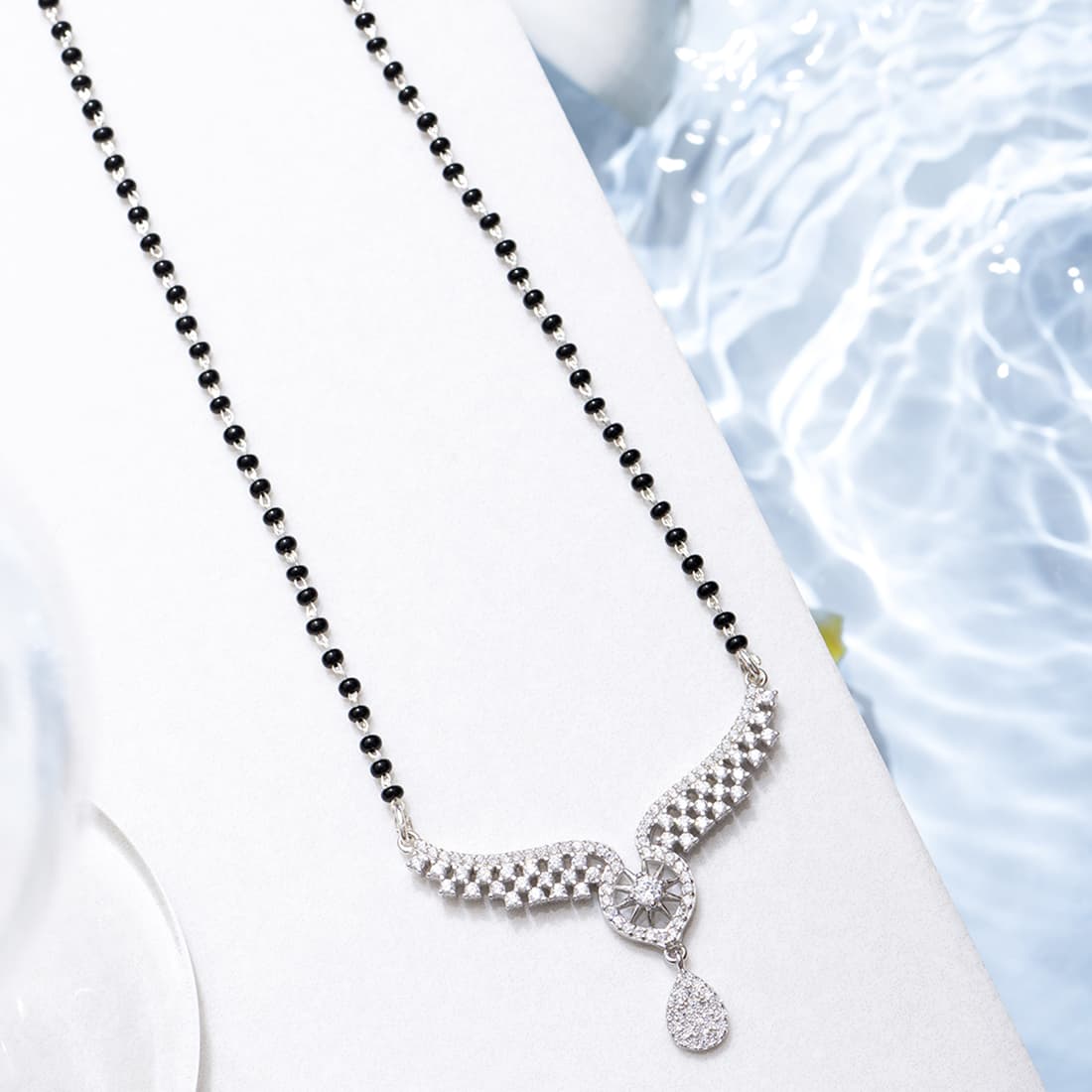 925 Sterling Silver mangalsutra necklace for women with black beads and sparkling angel wings pendant – Zavya