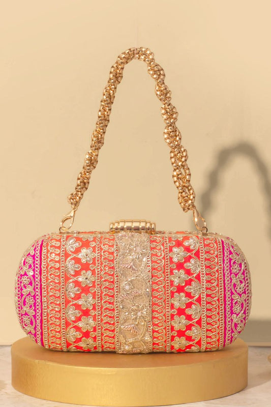 AMYRA - Naaz Capsule clutch - Orange and Pink