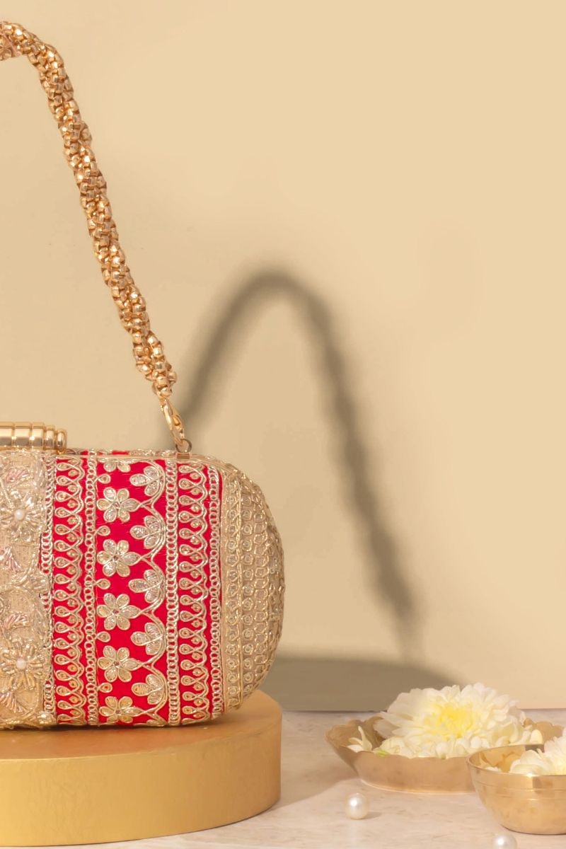 AMYRA - Naaz Capsule clutch - Red and Gold