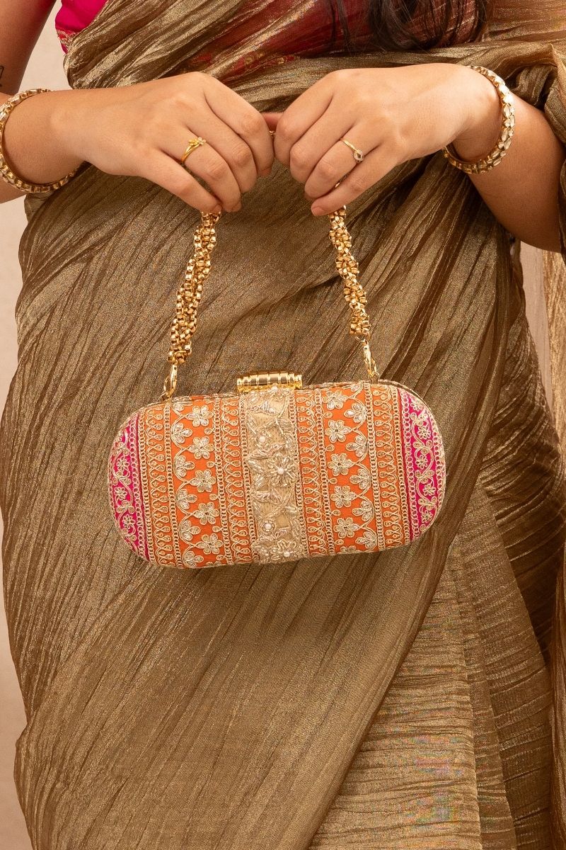 AMYRA - Naaz Capsule clutch - Orange and Pink