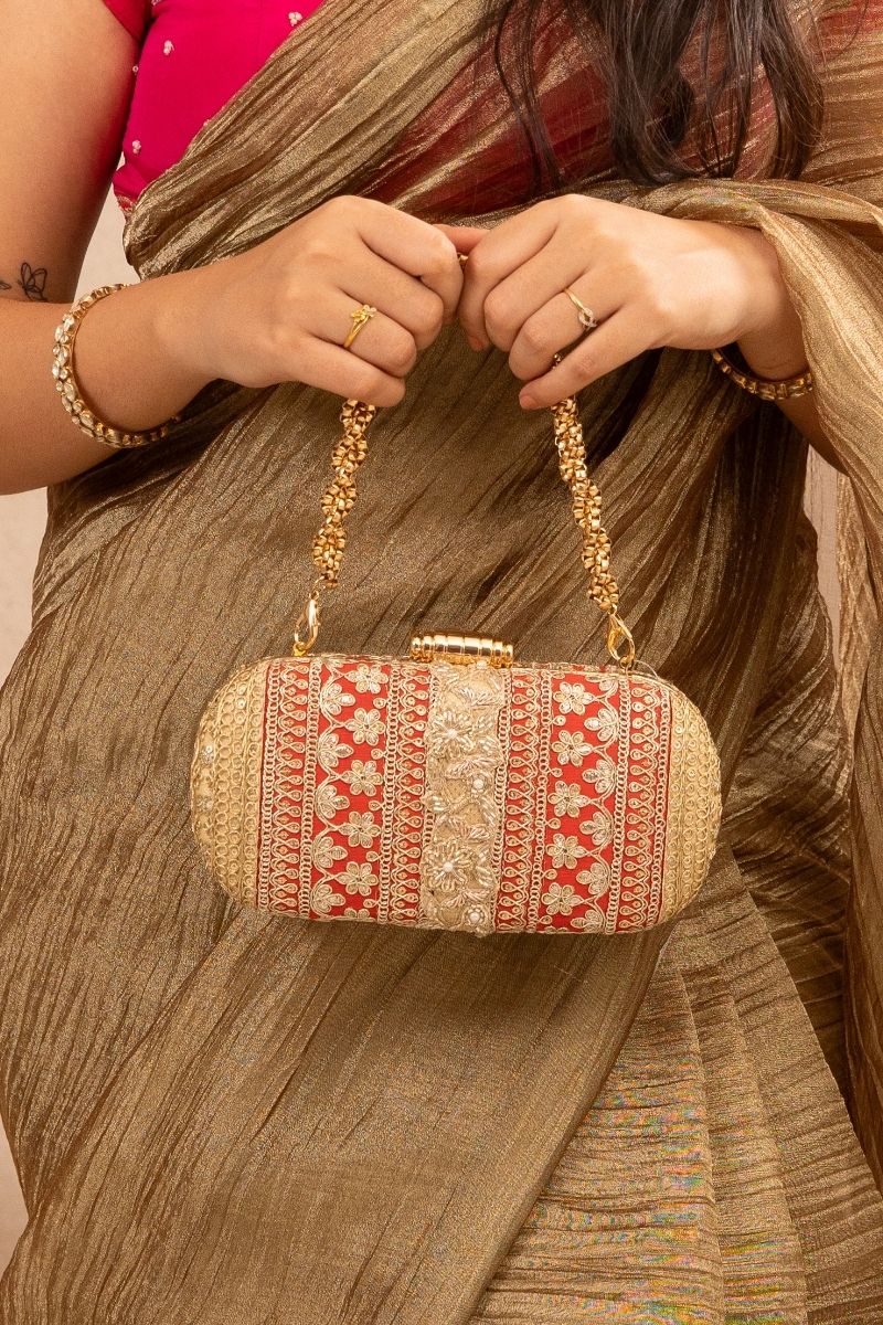 AMYRA - Naaz Capsule clutch - Red and Gold