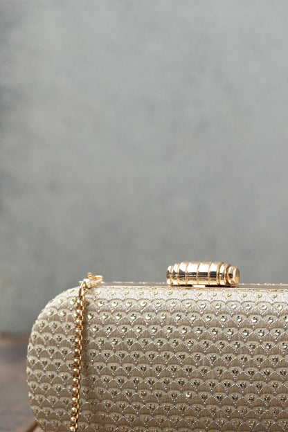 AMYRA - Champagne Capsule Clutch