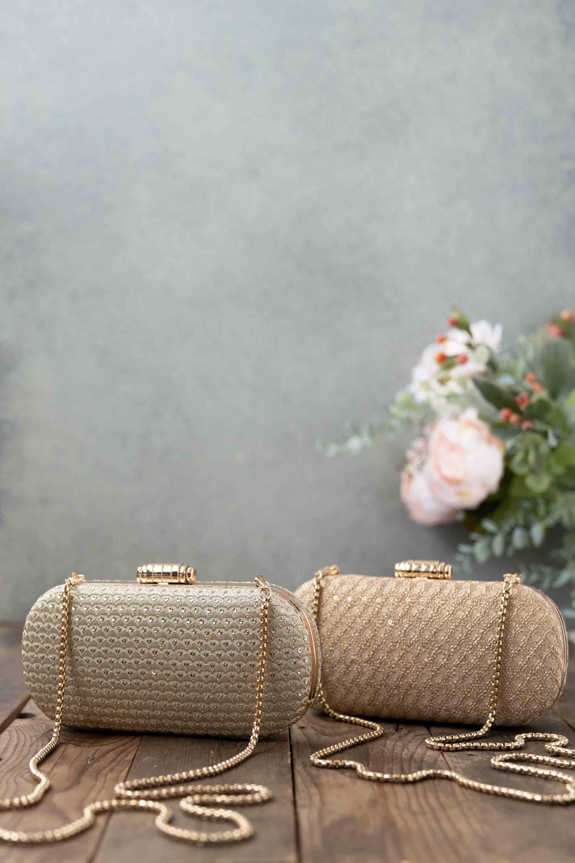 AMYRA - Champagne Capsule Clutch