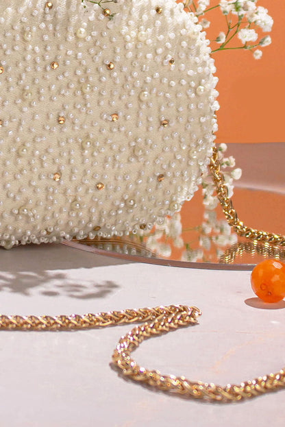 AMYRA - Perla Capsule Clutch