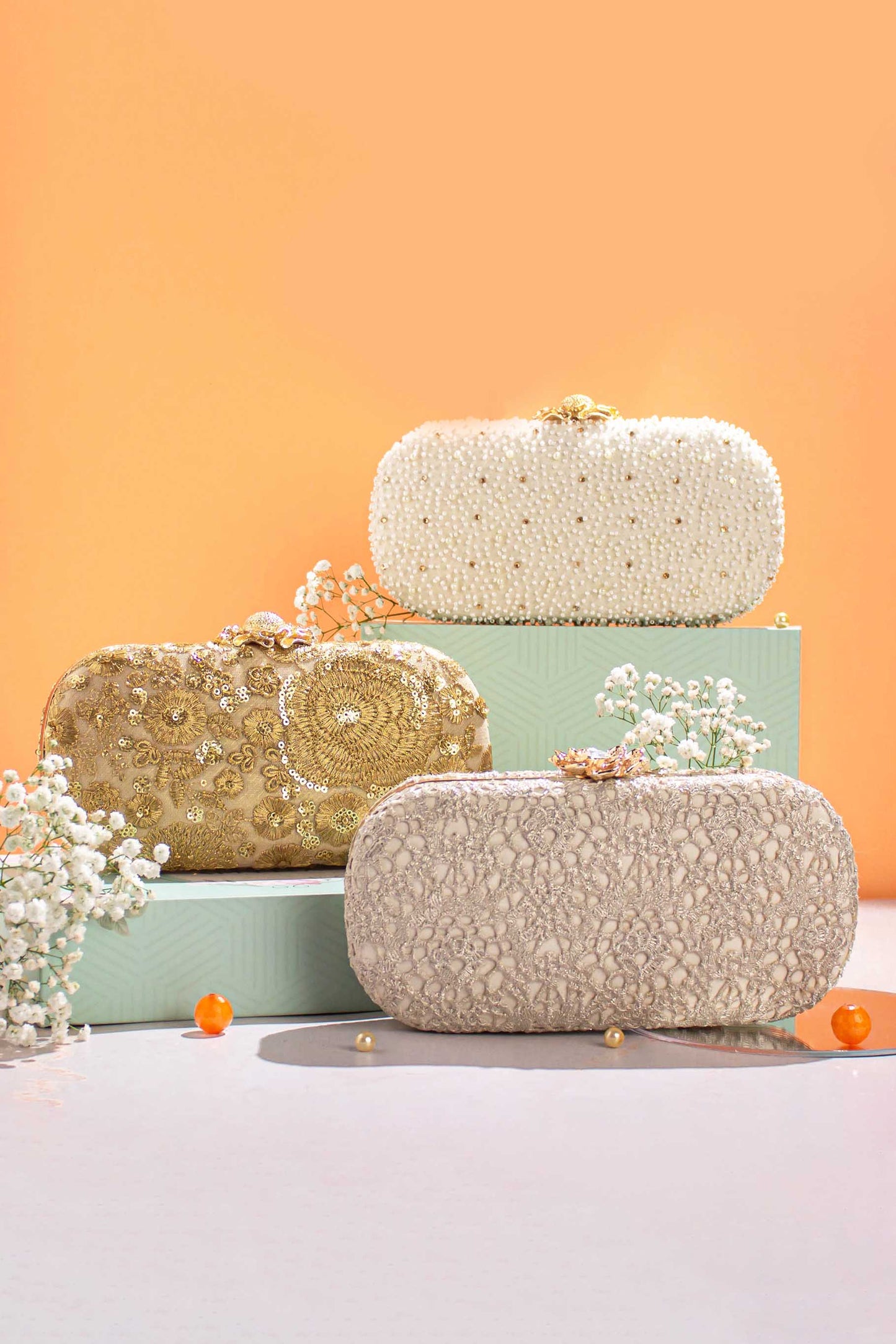AMYRA - Perla Capsule Clutch