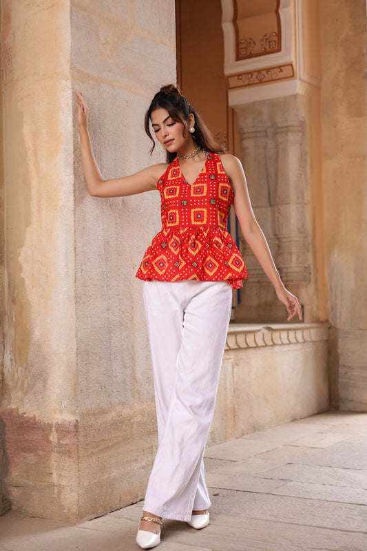 Red printed cotton sleeveless peplum top