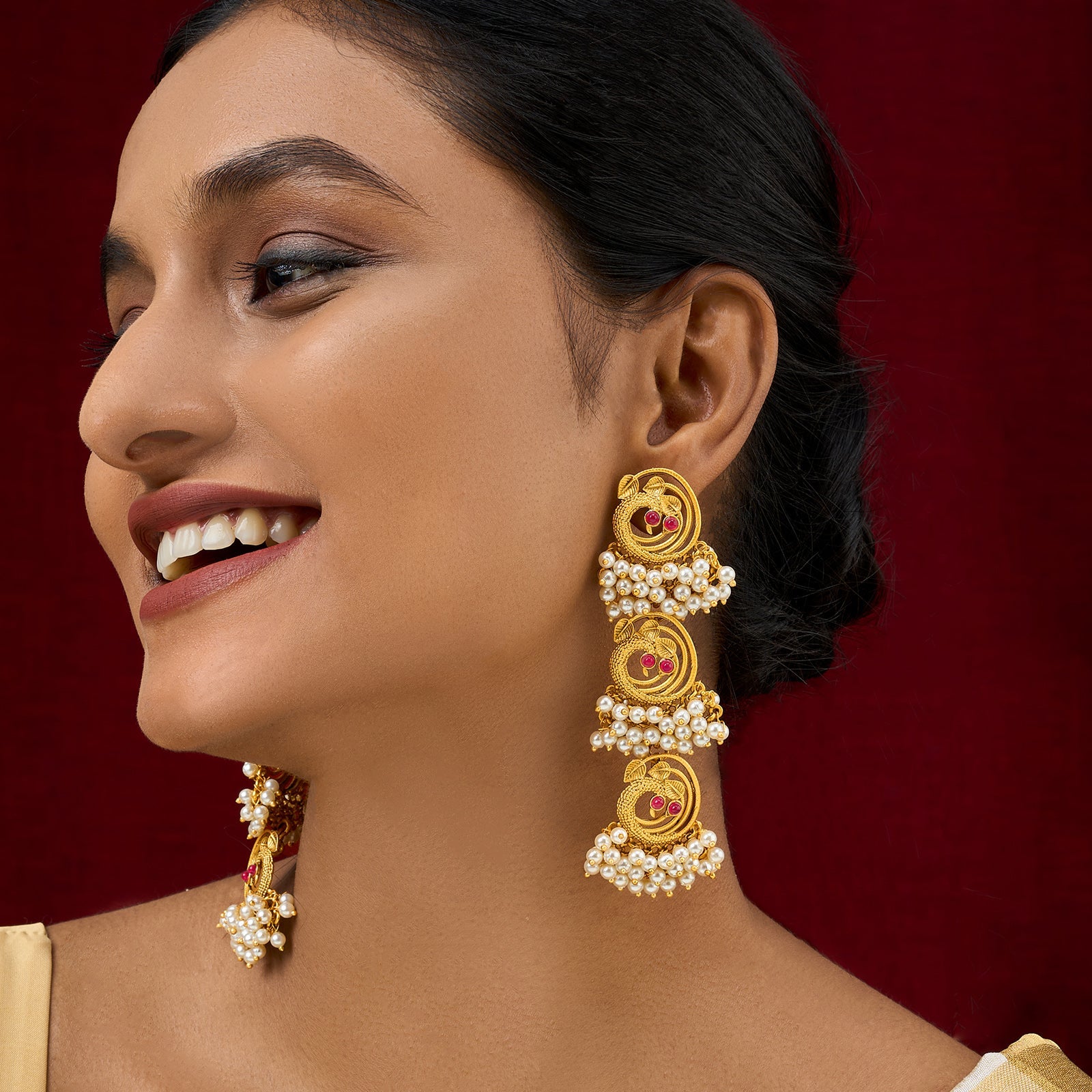 Teejh Neelraag Gold Oxidised Peacock Dangler Earring
