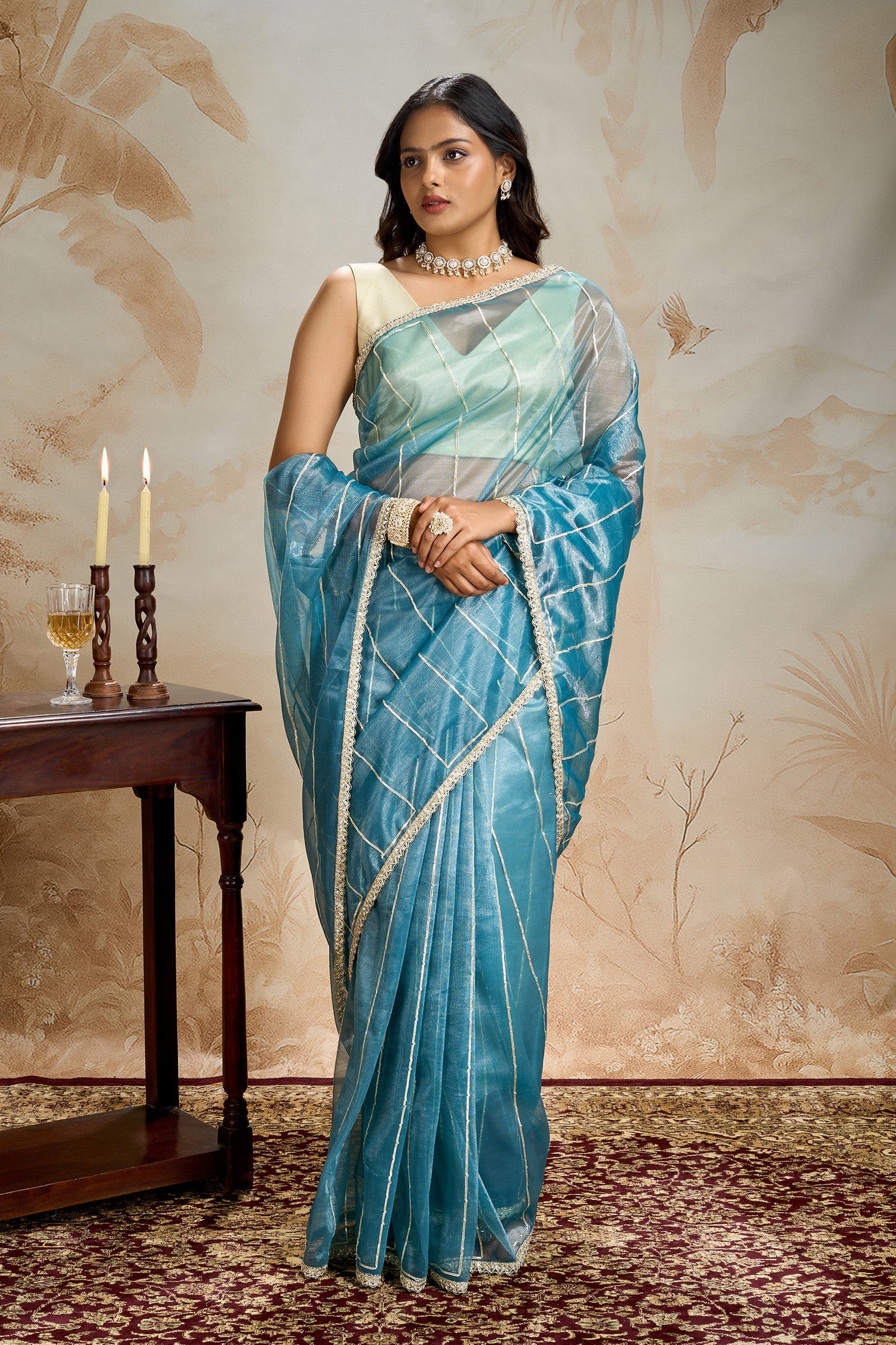 Teejh Ziaya Teal Blue Net Gota Saree