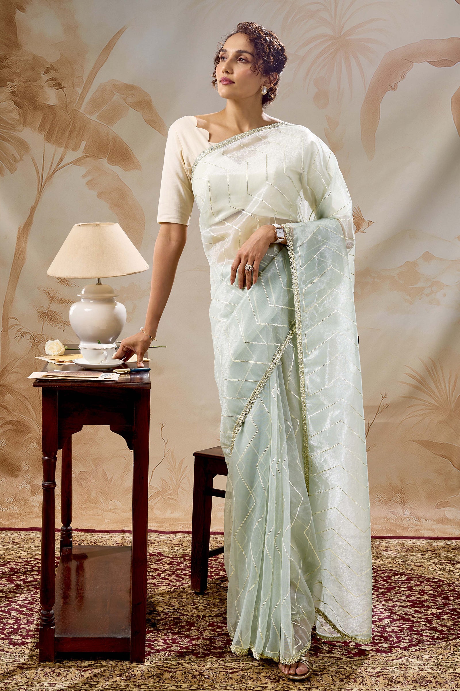 Teejh Rabina sage Green Net Gota Saree