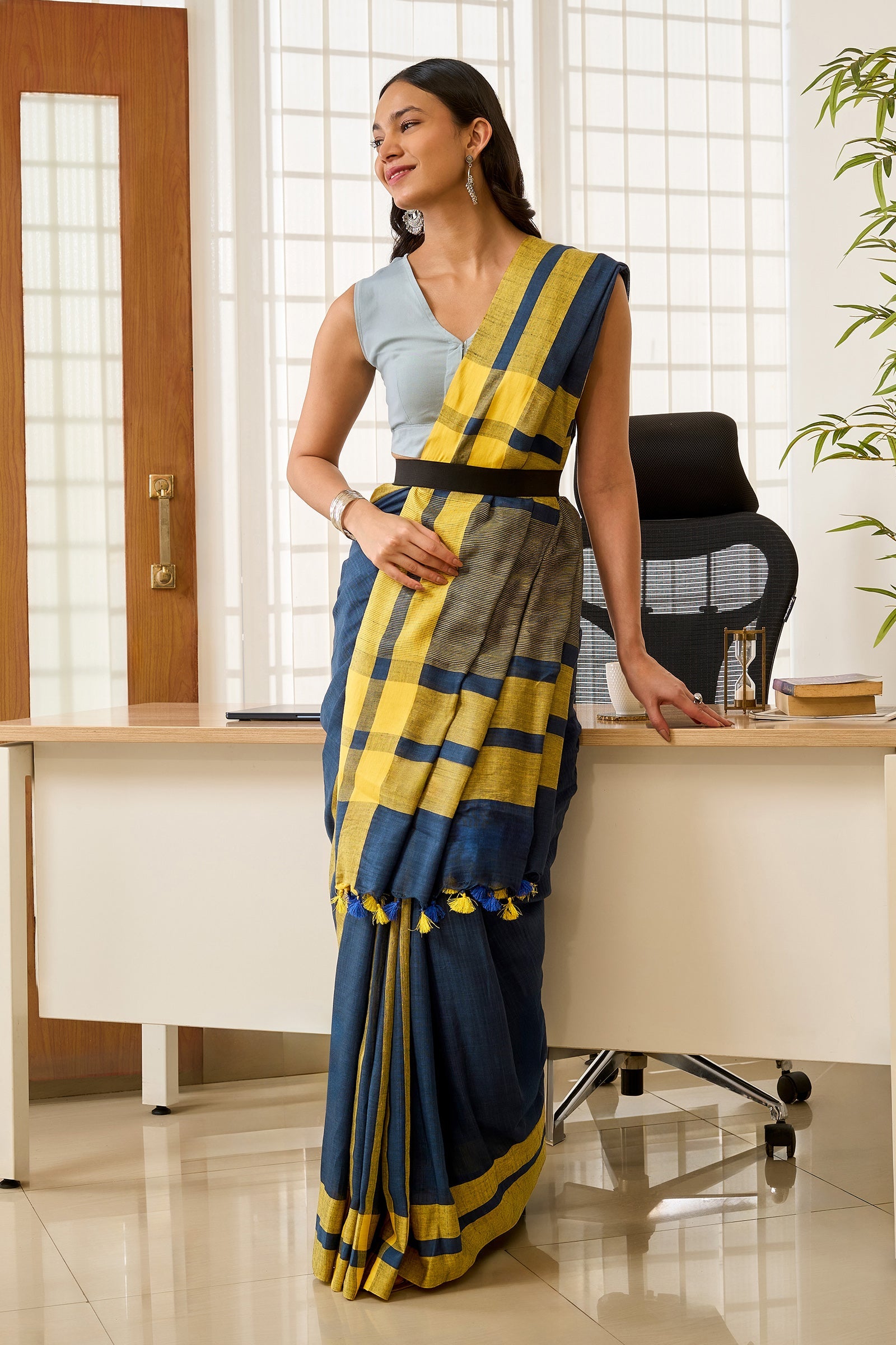 Teejh Edgy Tone Navy Blue and yellow Color Block Saree