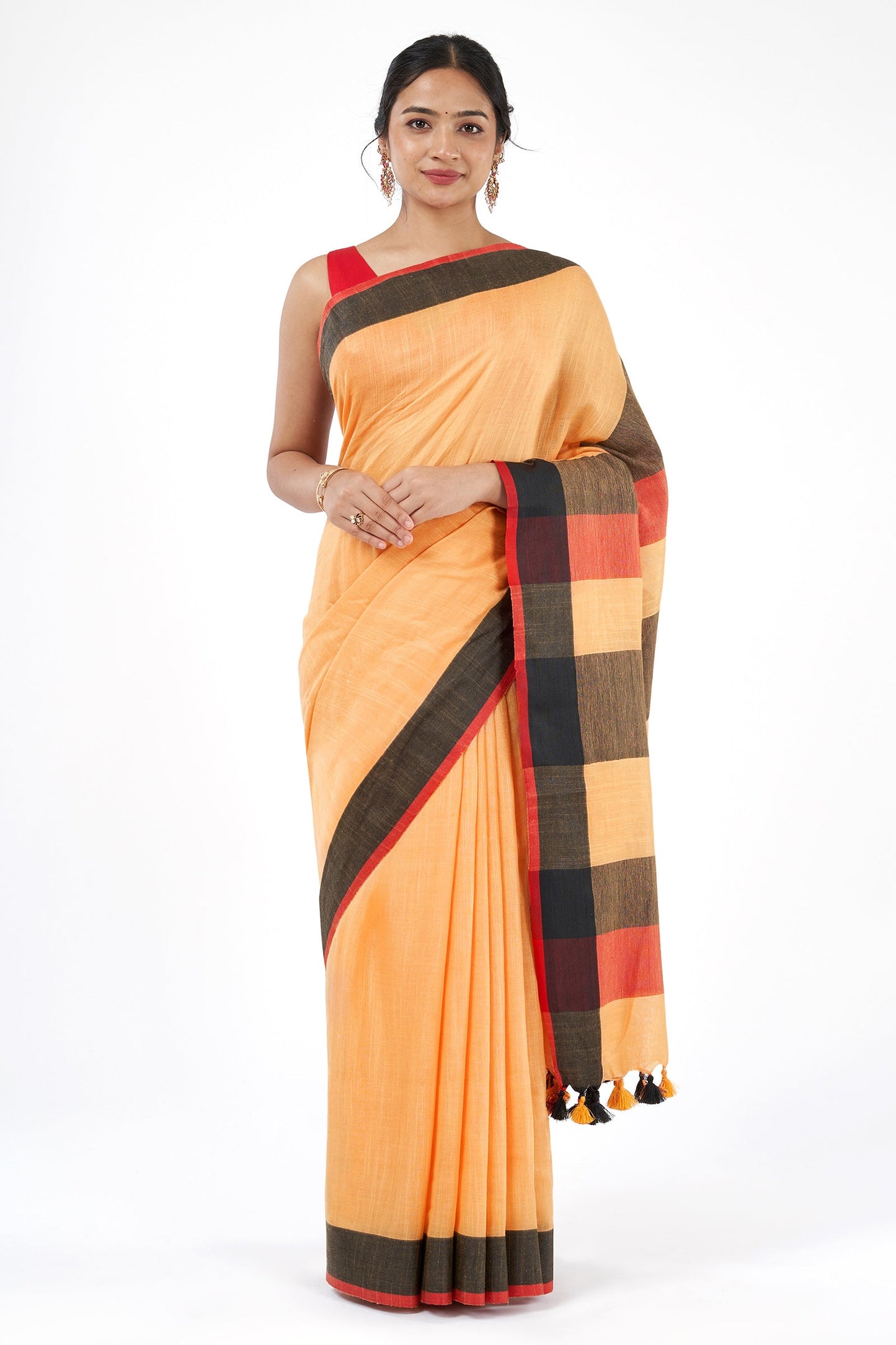 Teejh Soothing Peach, red and black Color Block Saree