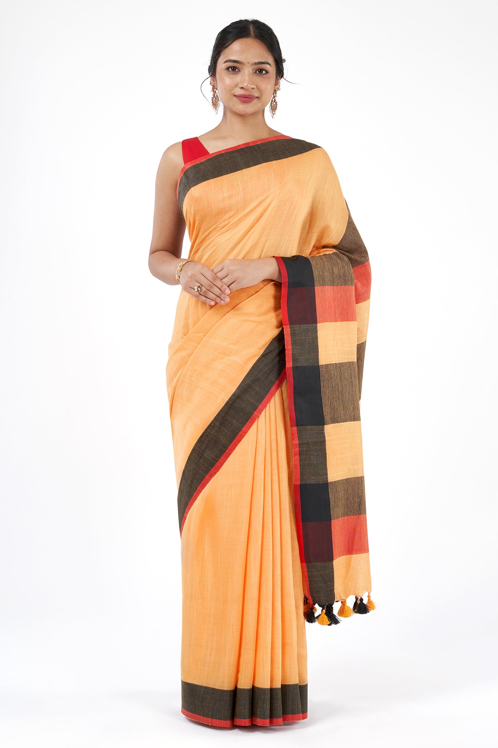 Teejh Soothing Peach, red and black Color Block Saree